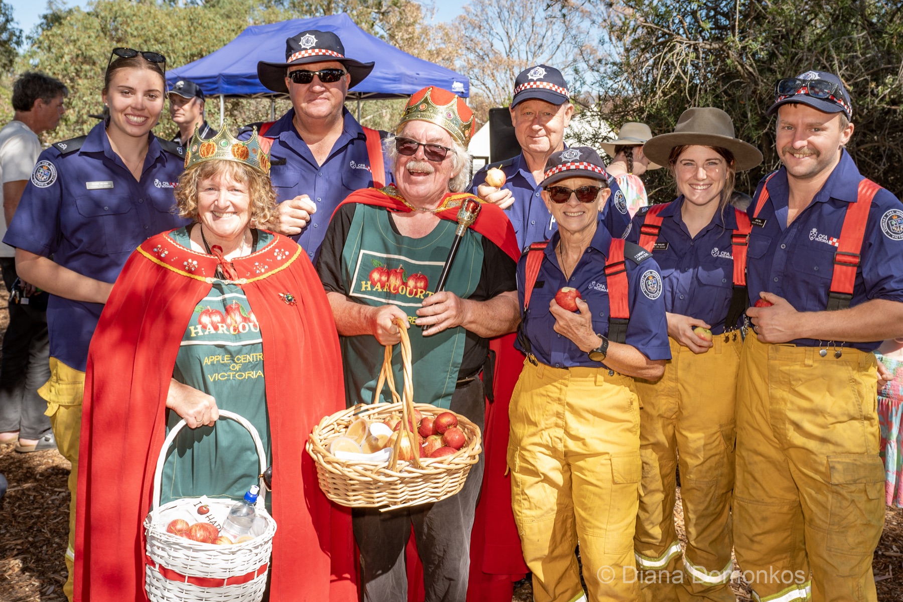Colourfully dressed community performers at Applefest